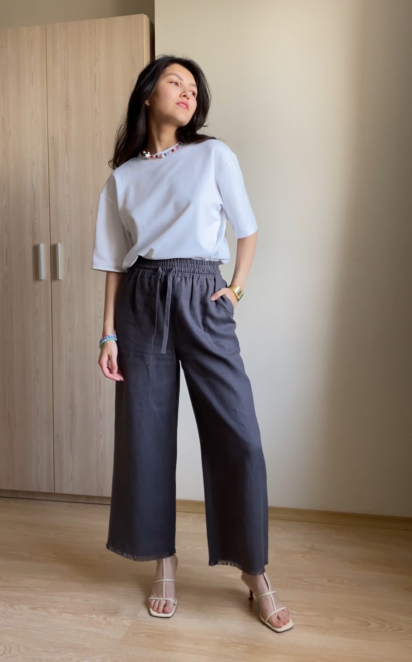 Штани палаццо вкорочені з бахромою на гумці